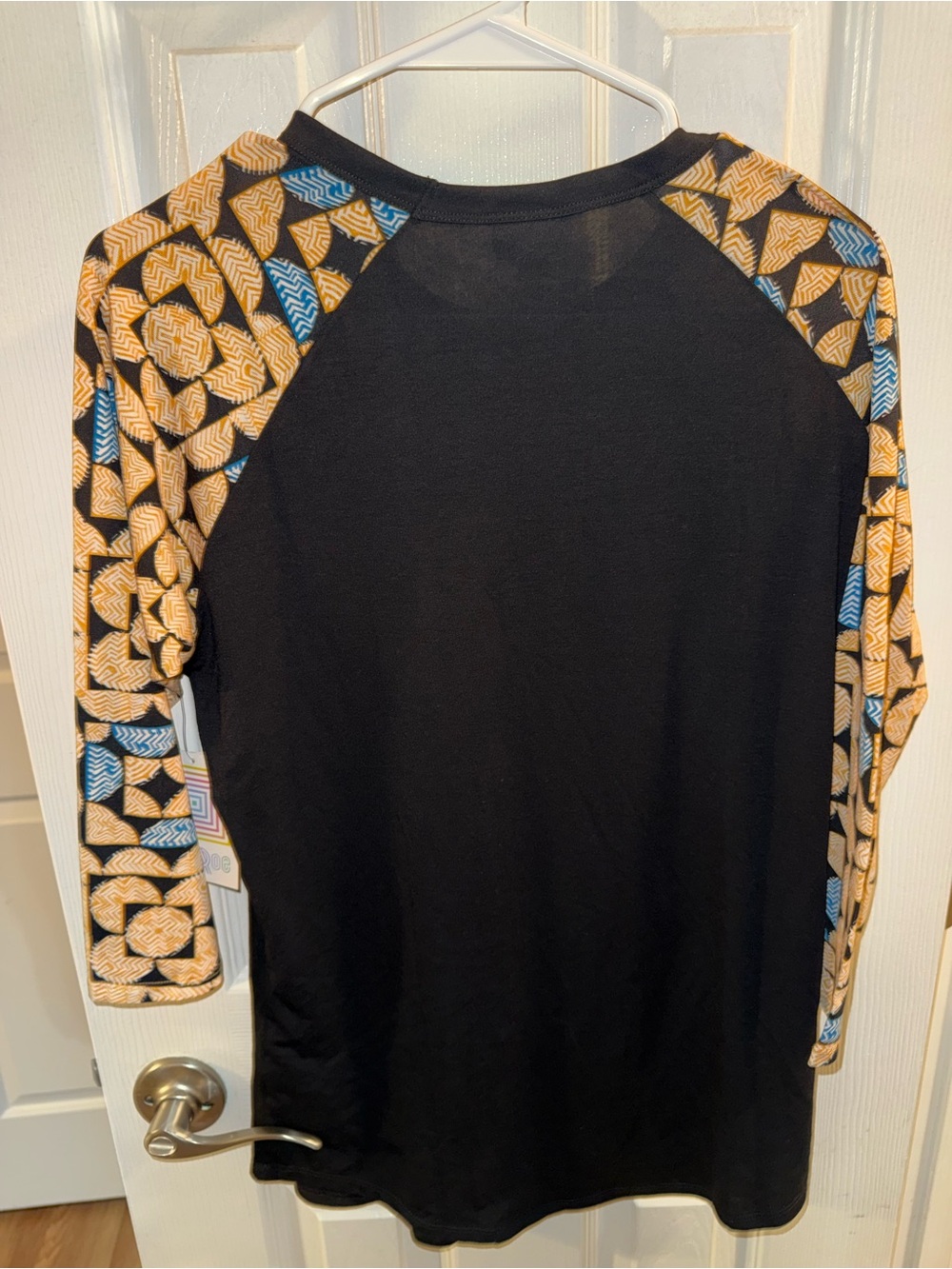 LuLaRoe Womens Small Black Raglan Tee with Tan and Blue Patterned Sleeves - Picture 2 of 3